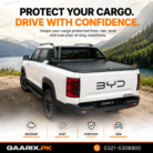 BYD Shark 6 OEM Manual Single Lock Trunk Shutter Lid installed on a white BYD Shark 6 pickup with factory-fit heavy-duty aluminum cargo bed cover and single lock security system